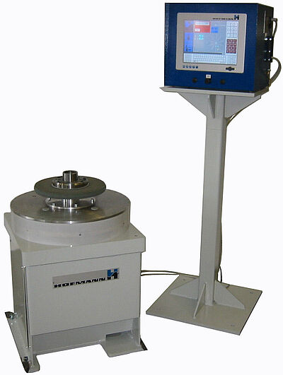 Non-rotating balancing machine