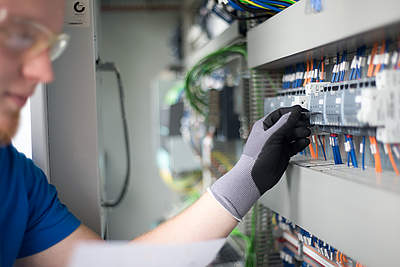 Our electronics engineer at the electrical production of the RGM-G